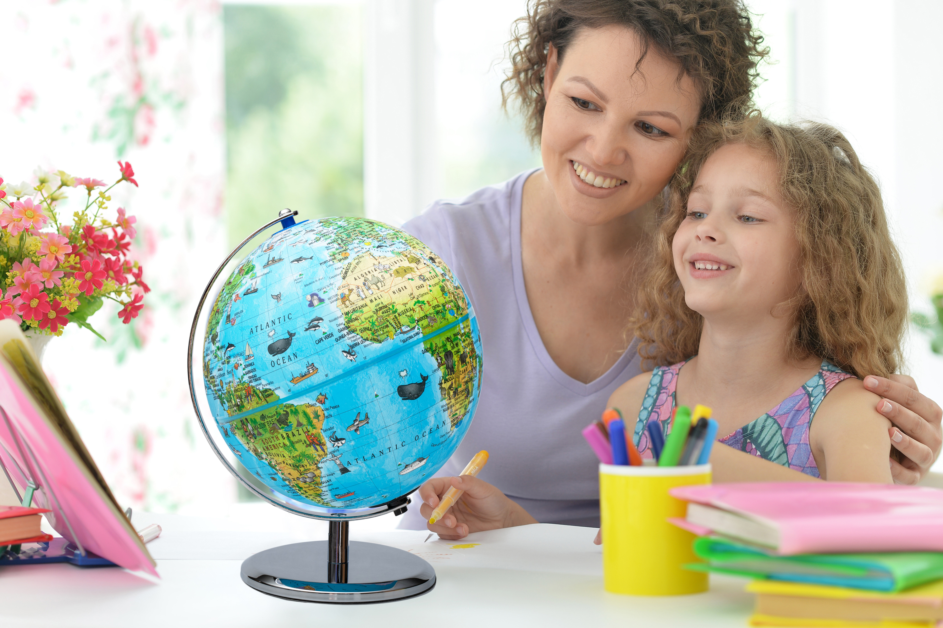 Portrait,Of,Mother,Helping,Her,Daughter,With,Homework Portrait,Of,Mother,Helping,Her,Daughter,With,Homework